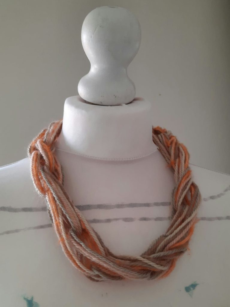 Knitting without needles - finger knitted i-cord necklace